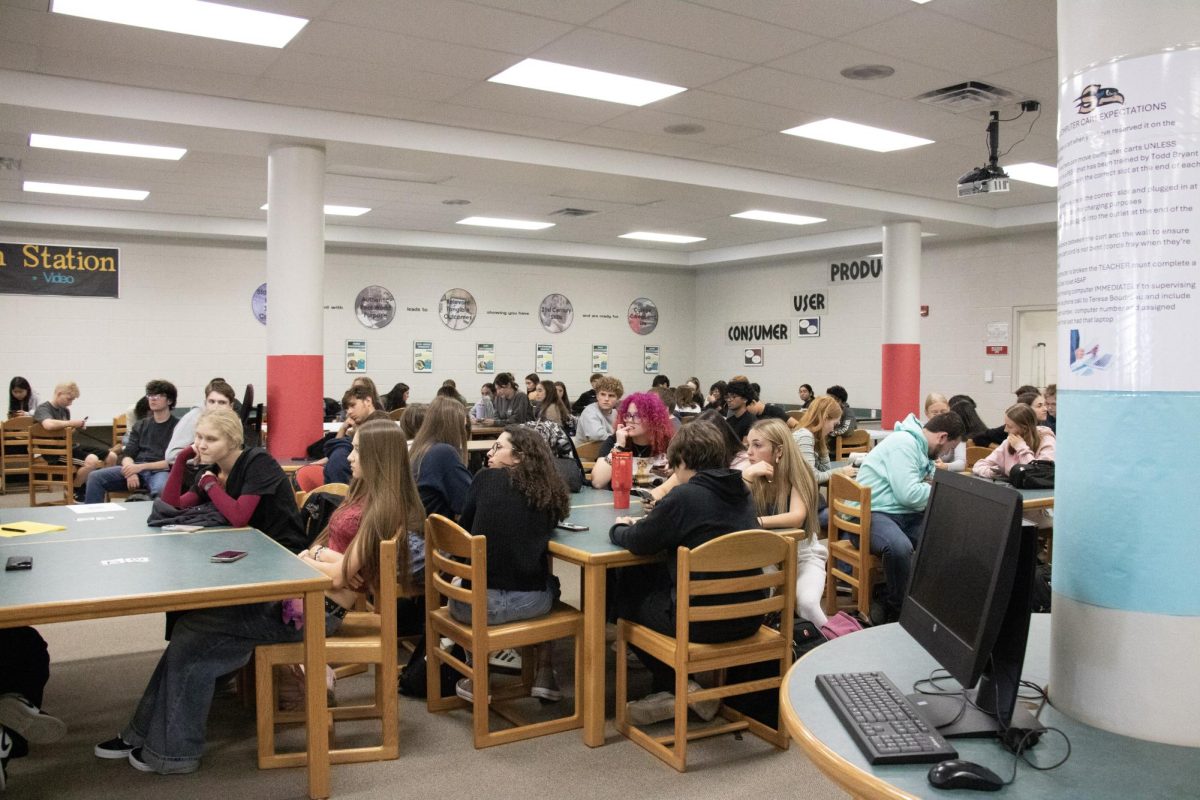 Members of the NHS club listening to events coming up.