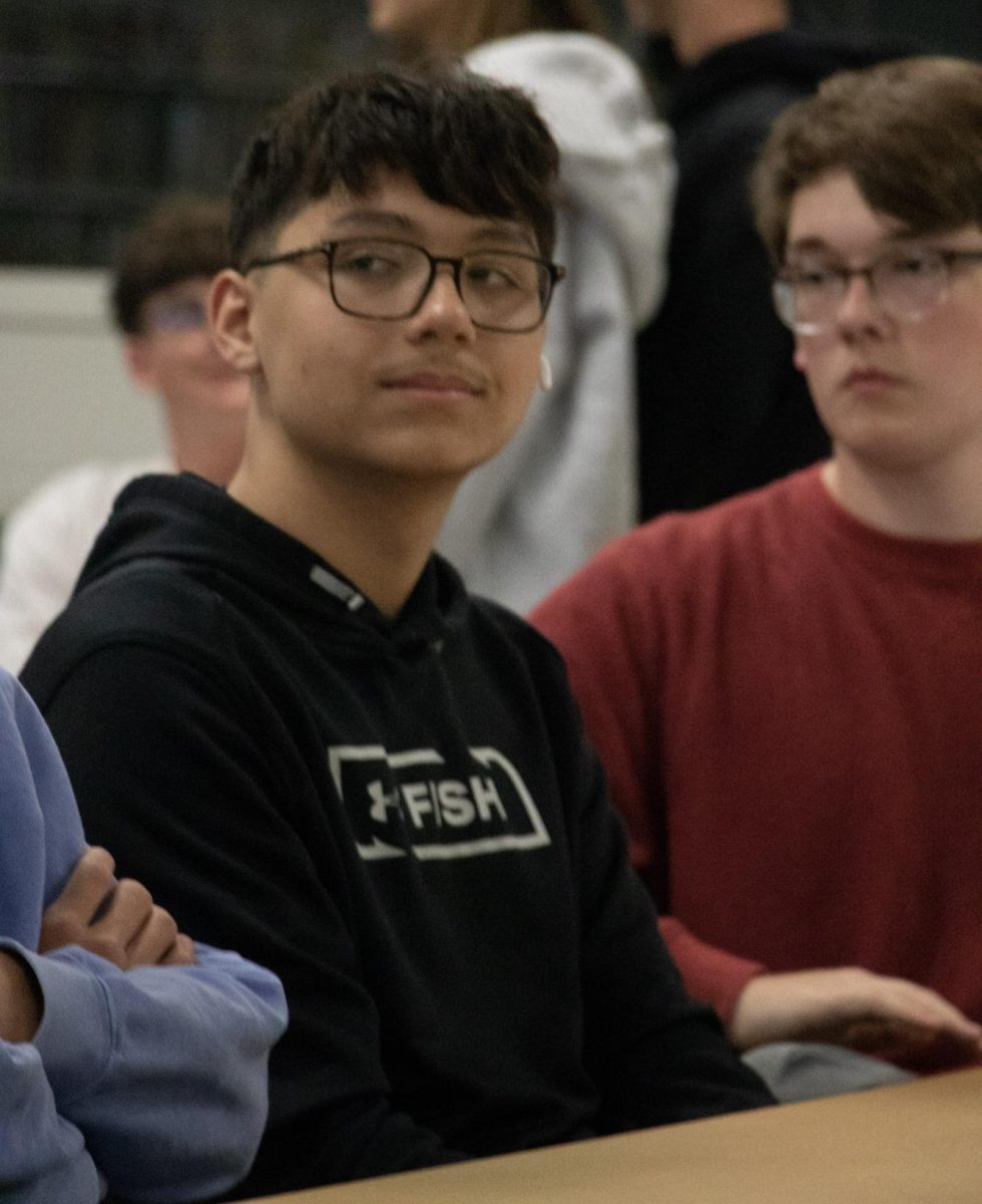 Tanner Gummoe; Junior, at the NHS meeting listening to the NHS representatives talk about the blood drive