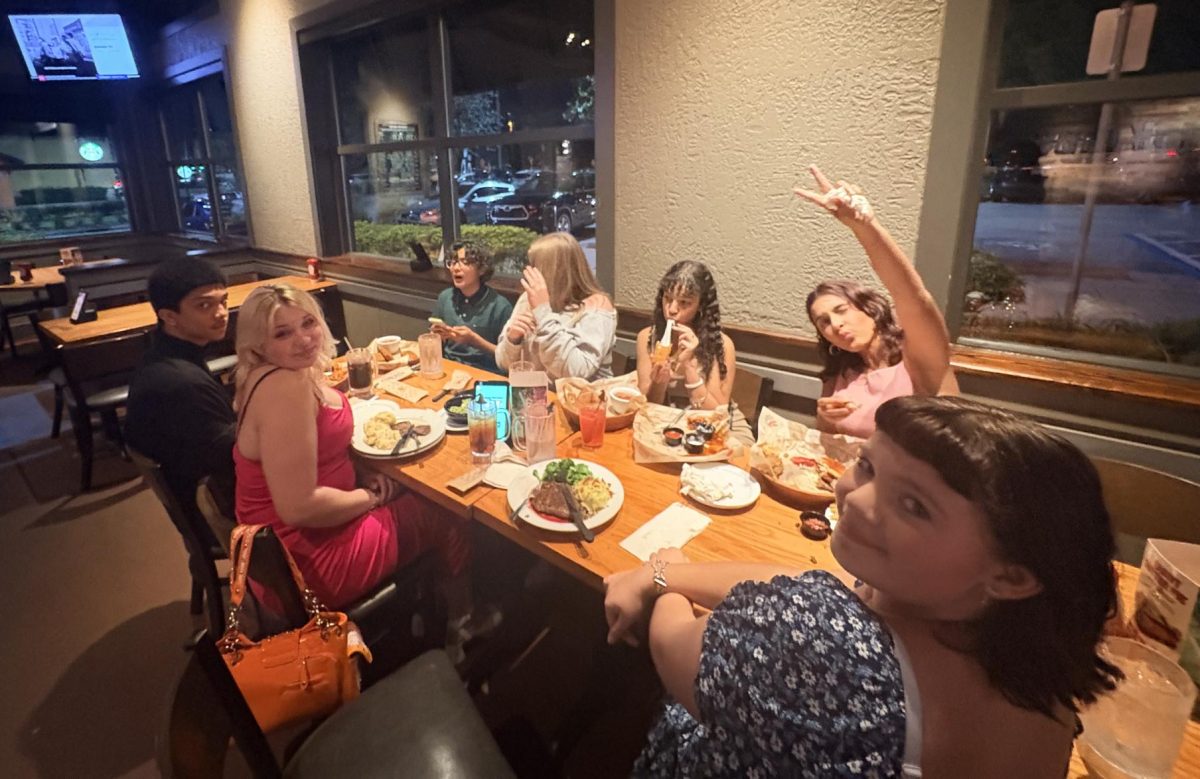 All of Reese's friends eating their food at Chili's for their Friendsgiving dinner.
-Picture taken by Reese