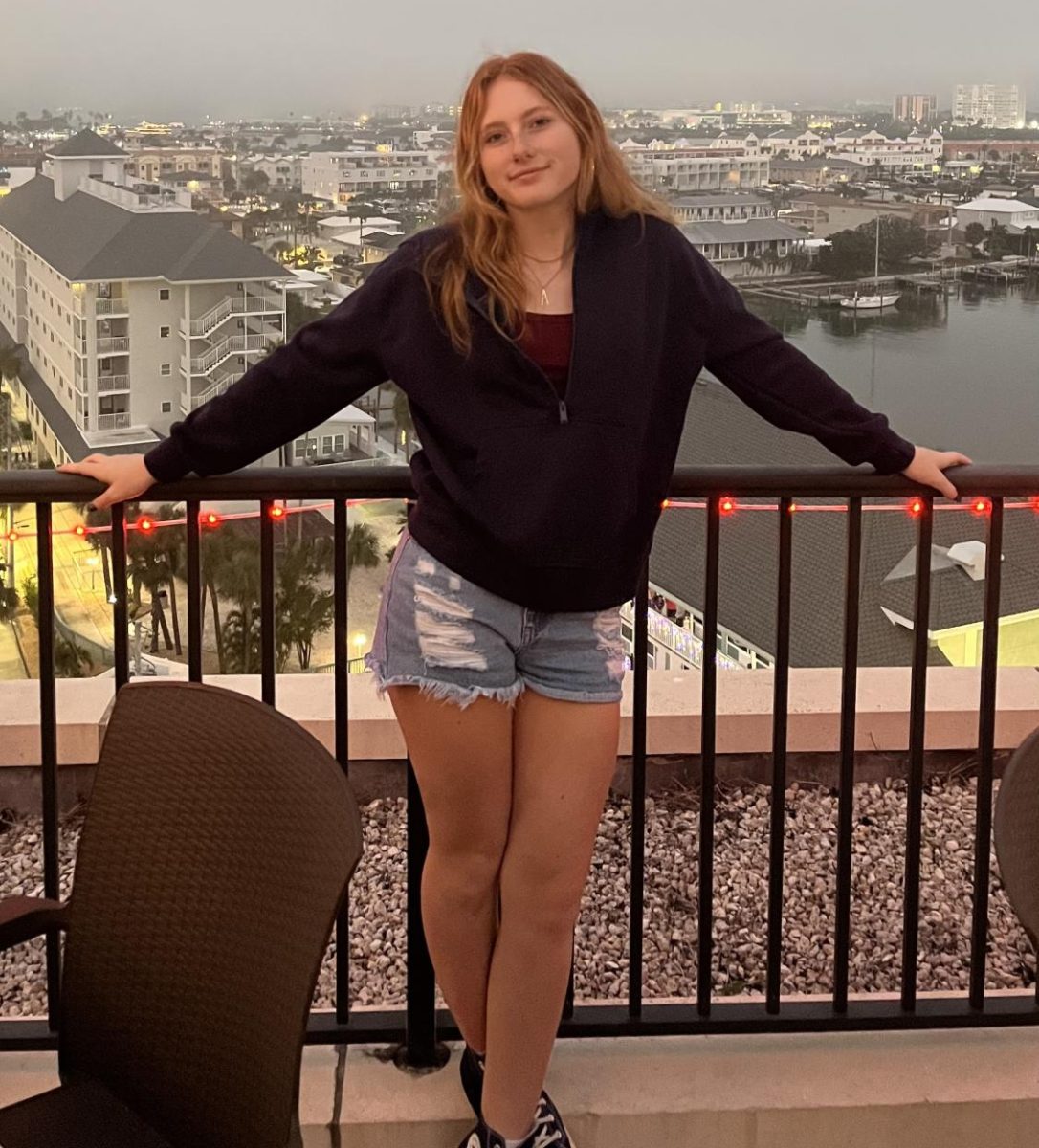 Sophomore Ashlynn Lawson on the balcony of Shephard's Beach Resort in Clearwater. This is where she stayed with her father. She noted that it was very foggy most of the time, but that added a sense of whimsy to the atmosphere.