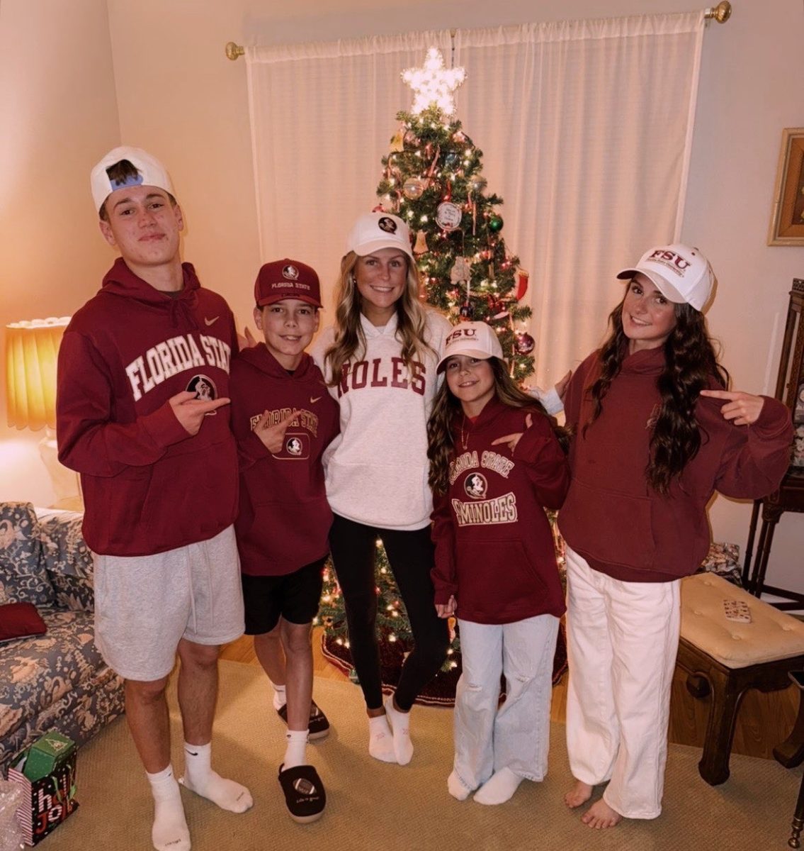 Reese Van Brocklin and her cousins on Christmas eve. Reese said the FSU merchandise was her "favorite present" she got. Reese thought it was so sweet her grandma got everyone merch to celebrate Reese's acceptance and commitment into the university.