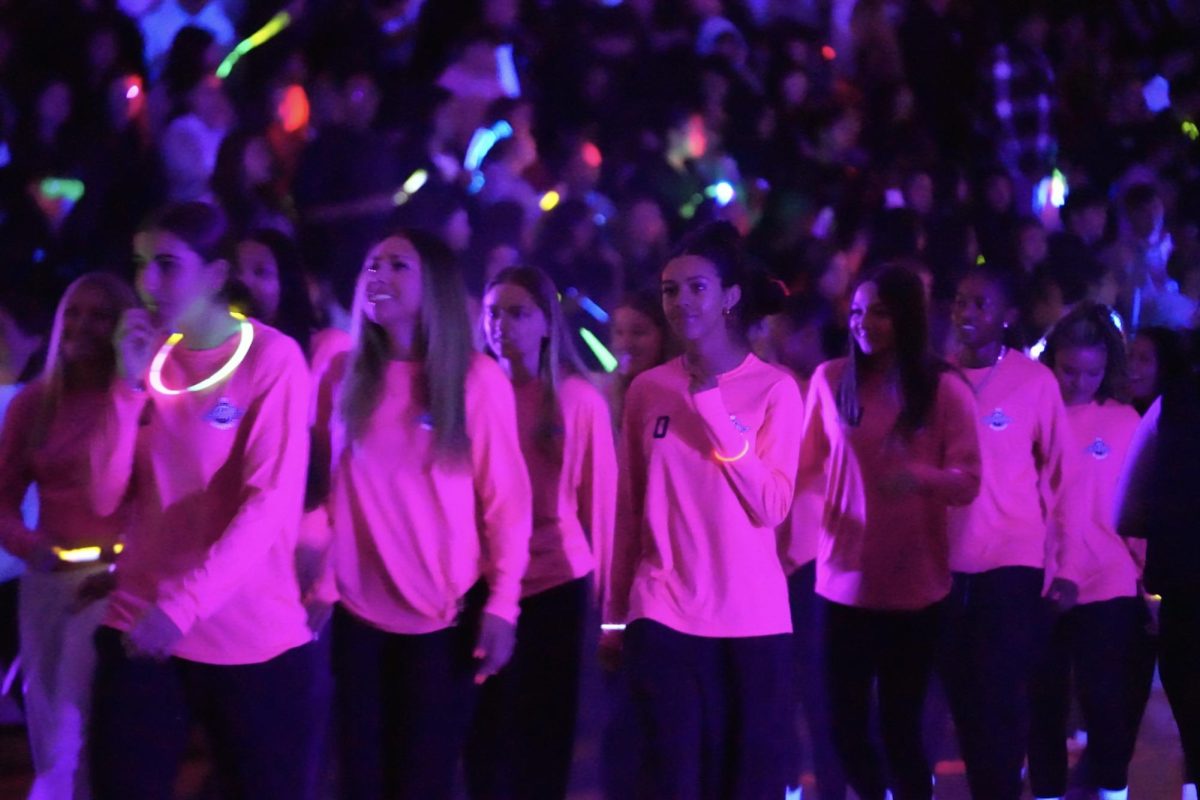 The Sunlake Girl's Basketball team at the neon Winter Sports Pep Rally