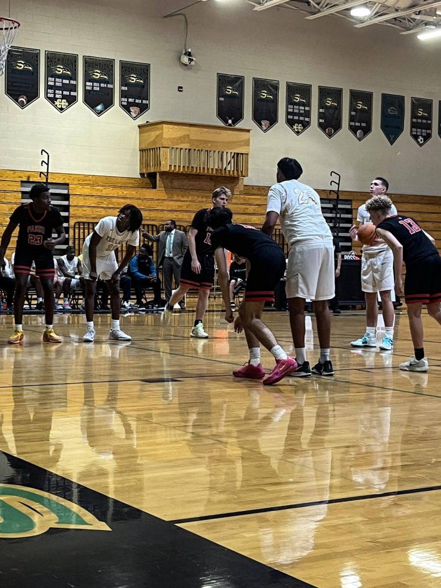 Caleb price about to make a free-throw.