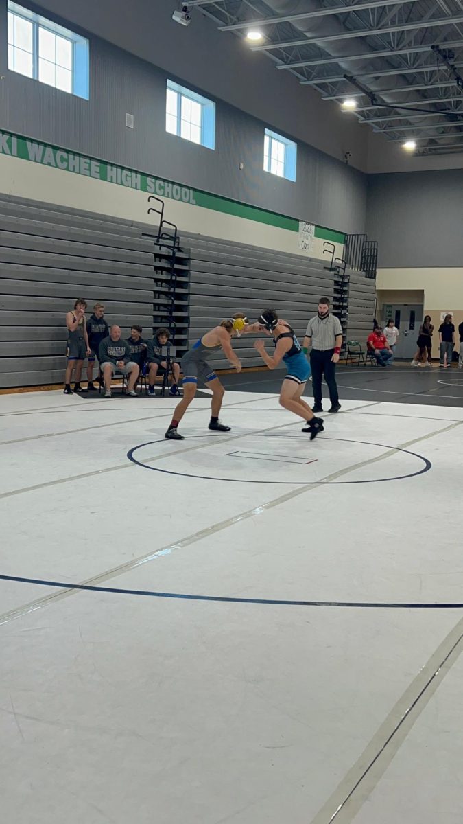Freshman Jace Willson, in the middle of a wrestling match. 